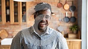 Head shot portrait of happy 30s african american hipster man.