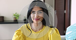 Head shot portrait Indian woman smile looking at camera