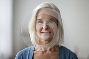 Head shot profile picture of mature Caucasian woman