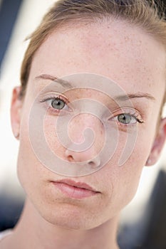 Head shot of woman thinking