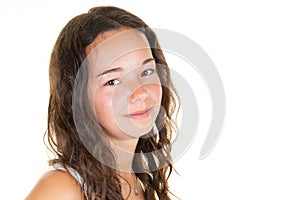 Head shot of young woman with beautiful face aside copy space looking at camera on white background