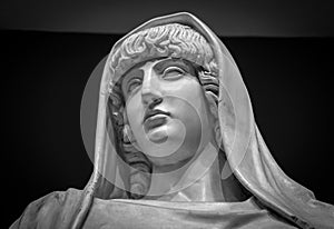 Head and shoulders detail of the ancient sculpture