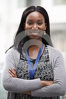 Head And Shoulders Portrait Of Businesswoman In Office