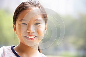 Head And Shoulders Portrait Of Chinese Girl