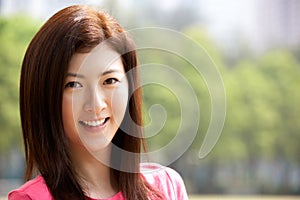 Head And Shoulders Portrait Of Chinese Woman