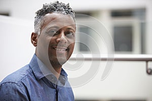 Head and shoulders portrait of a middle aged black man photo