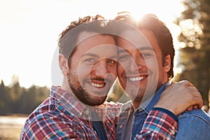 Head And Shoulders Portrait Of Romantic Male Gay Couple