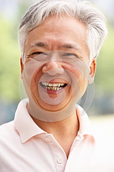 Head And Shoulders Portrait Of Senior Chinese Man