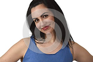 Head and shoulders portrait of young beautiful hispanic woman smiling happy and relaxed