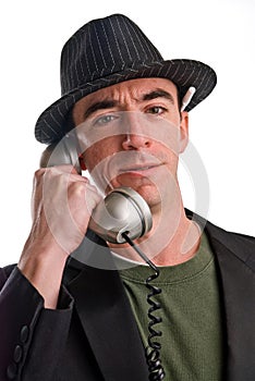 Head and shoulders shot of caucasian male wearing a hat