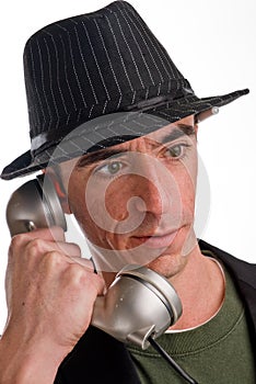 Head and shoulders shot of caucasian male wearing a hat