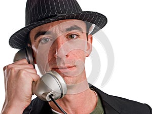 Head and shoulders shot of caucasian male wearing a hat