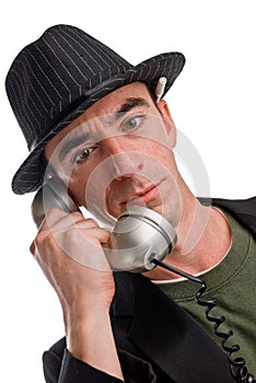 Head and shoulders shot of caucasian male wearing a hat