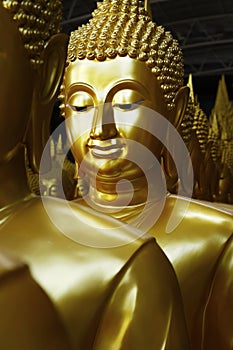 Head of statue of buddha, in buddhist temple ,with golden color