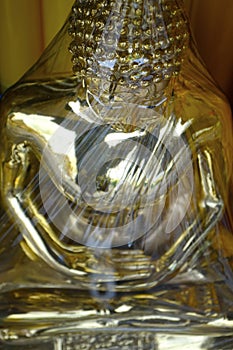 Head of statue of buddha, in buddhist temple ,with golden color