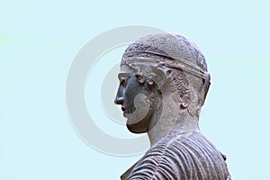 Head of the Statue of the Delphi Charioteer in the Delphi Museum. Built in bronze in 474 BC. to commemorate the victory of a photo