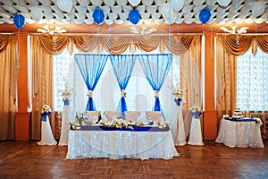 Head table for newlyweds at the wedding hall