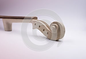 Head of Violin scroll put on white background,parts of acoustic instrument