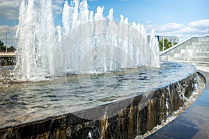 Head of water jets from fountain/Water fountain water jet over blue sky