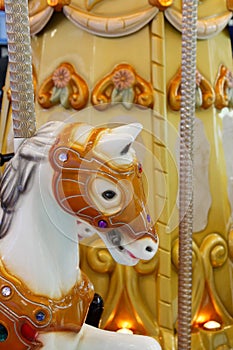 Head of a wooden horse on a vintage merry-go-round