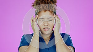 Headache, black woman and pain from stress, burnout and uncomfortable ache in studio on pink background. Migraine