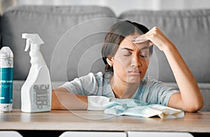 Headache, cleaning stress and tired black woman cleaner feeling burnout from housekeeping. Home, dust cloth and fatigue