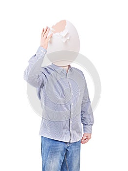 Headache concept. Man touching his head egg symbolizing a head ache on white