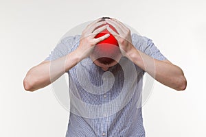Headache and migraine, man with head pain on white background