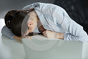 Headache and Stress at Work. Portrait of Young Business Woman at