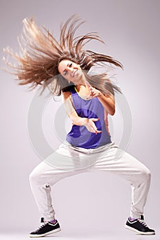 Headbanging woman dancer