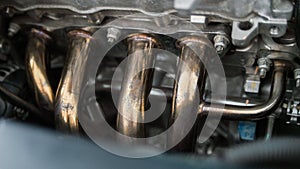 Header exhaust in car