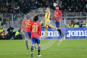 Heading duel Gerard Pique and Florin Andone