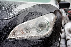 Headlamp of car after freezing rain