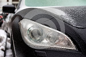 Headlamp of car after freezing rain