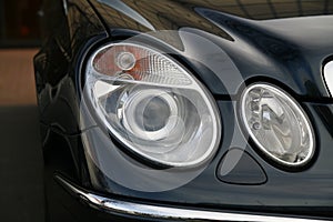 Headlamp of expensive car photo