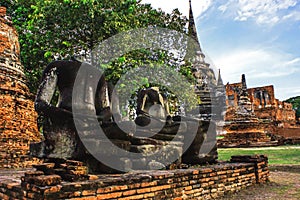 Headless Buddha in attitude of meditation statue ruins in Wat Phra Sri Sanphet Historical Park, Ayutthaya province, Thailand