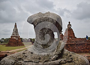 Headless buddha statue in Ayutthaya ruins temple heritage site