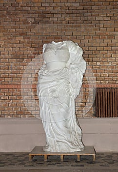 Headless female statue