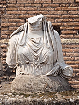 Headless roman statue