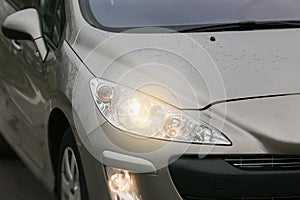 Headlight of a modern car. The front lights of the car. Modern Car exterior details.