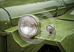 Headlight on a old military vehicle.