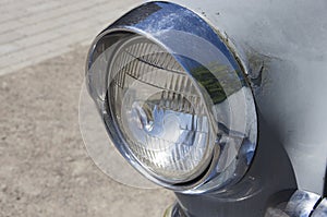 Headlight of old Volga car