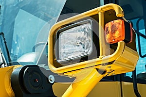 Headlight overall mounted on a tractor