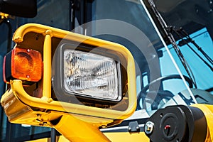 Headlight overall mounted on a tractor