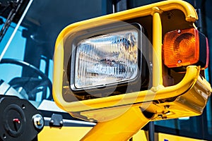 Headlight overall mounted on a tractor