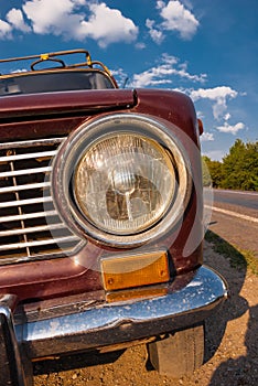 The headlight of a retro car close up. Soviet car