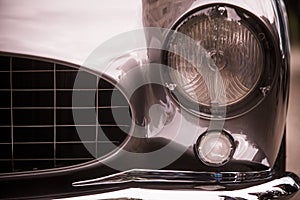 Headlight of a vintage classic car