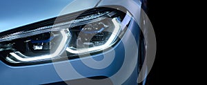 Headlight with xenon light of blue modern car