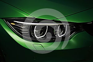 Headlights angel eyes green BMW M4 tuning in the dark