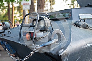 Headlights of armored tactical police vehicle.